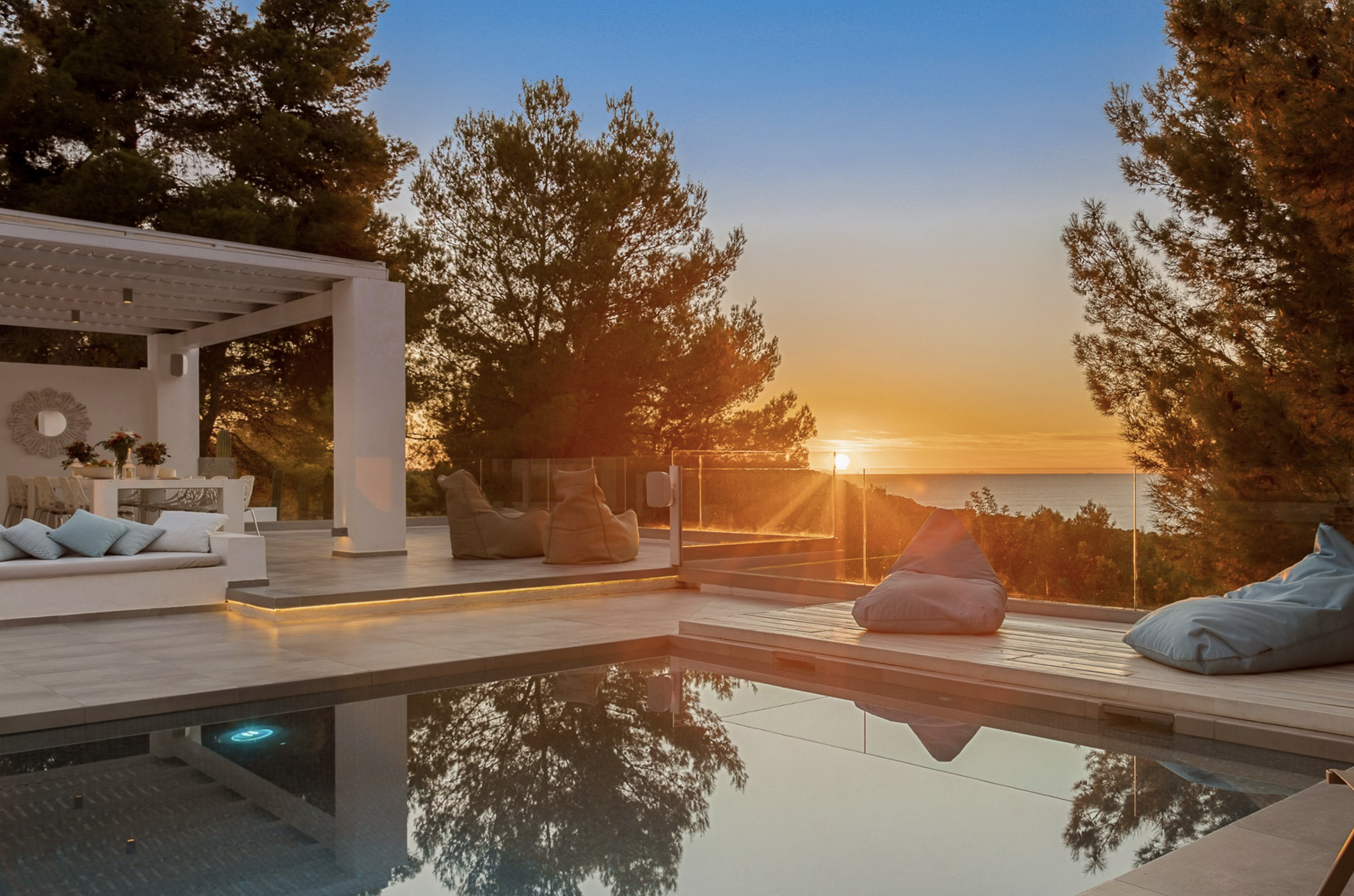 Resa Estates Ivy Cala Tarida Ibiza  luxe woning villa for rent te huur house sunset.png